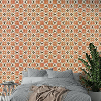Bold orange and brown tile pattern wallpaper for boho interiors.


