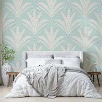 Boho style wallpaper featuring soft blue palm leaves

