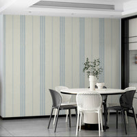 Subtle sky blue striped wallpaper for peaceful bedrooms

