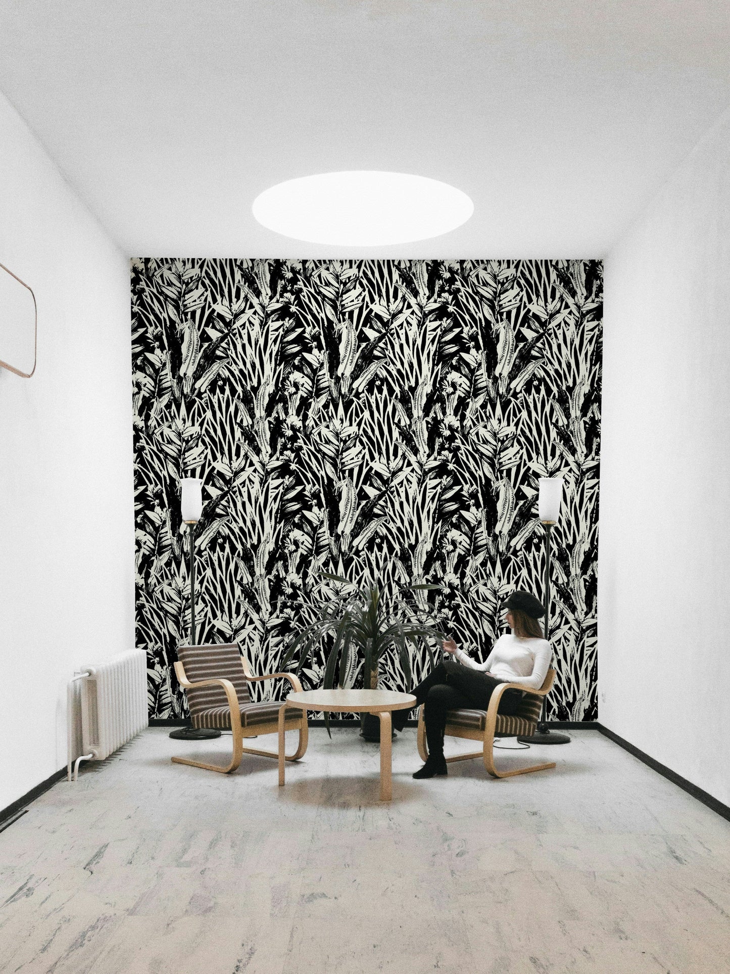 A full-wall mural showing a botanical pattern.
