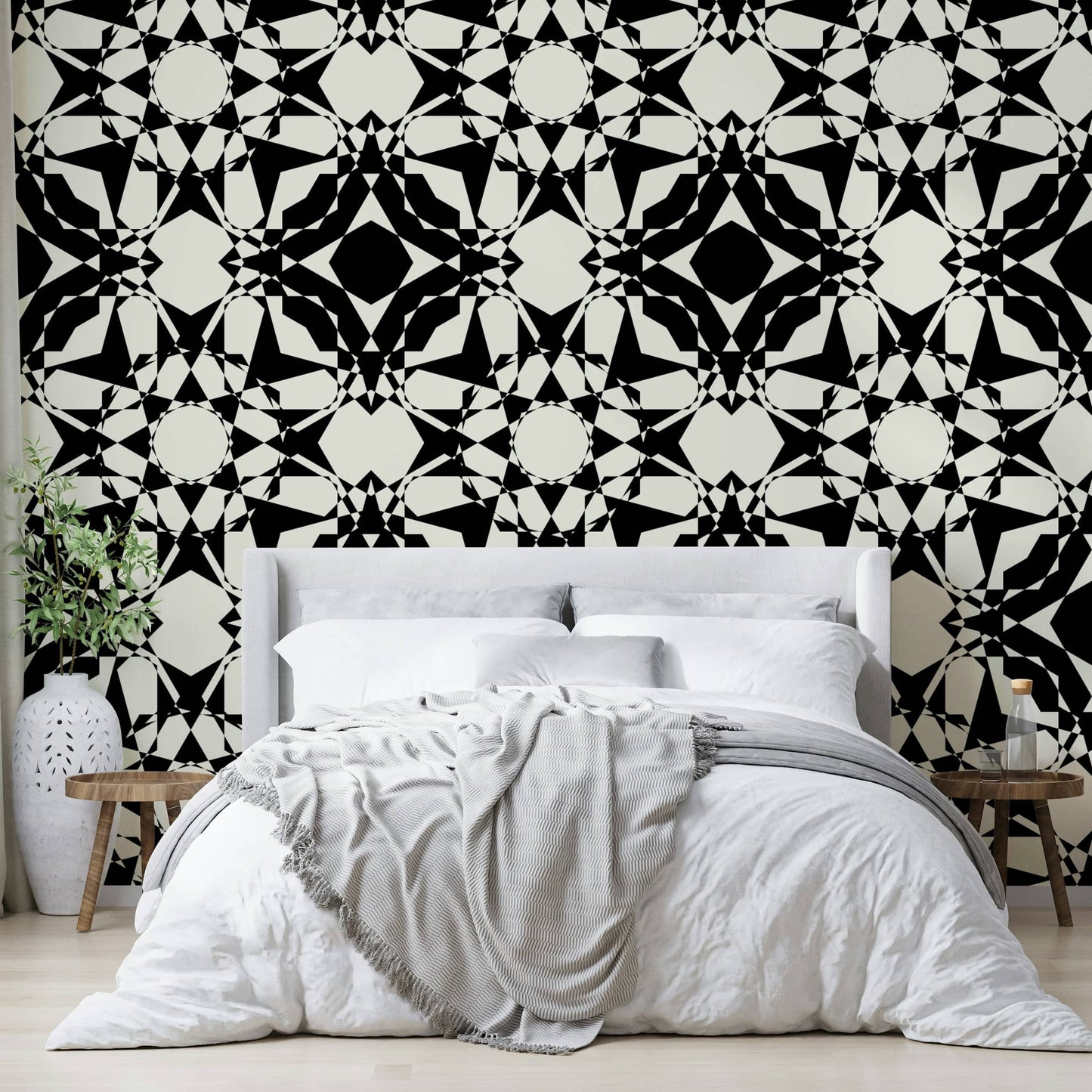 Modern geometric kaleidoscope wallpaper in black.
