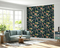 Vintage-style wallpaper mural featuring birds, blossoms, and greenery against a deep background.