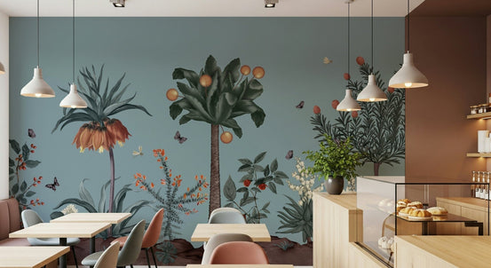 Botanical foliage wallpaper behind sofa, soft green colours and clean home styling