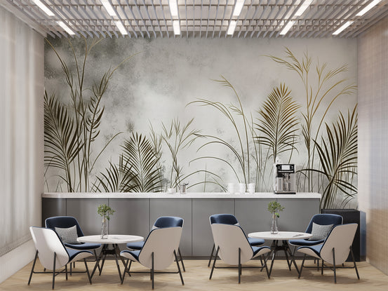 Botanical Gold Leaves wallpaper mural in a cafe area with navy chairs at round tables and a coffee counter