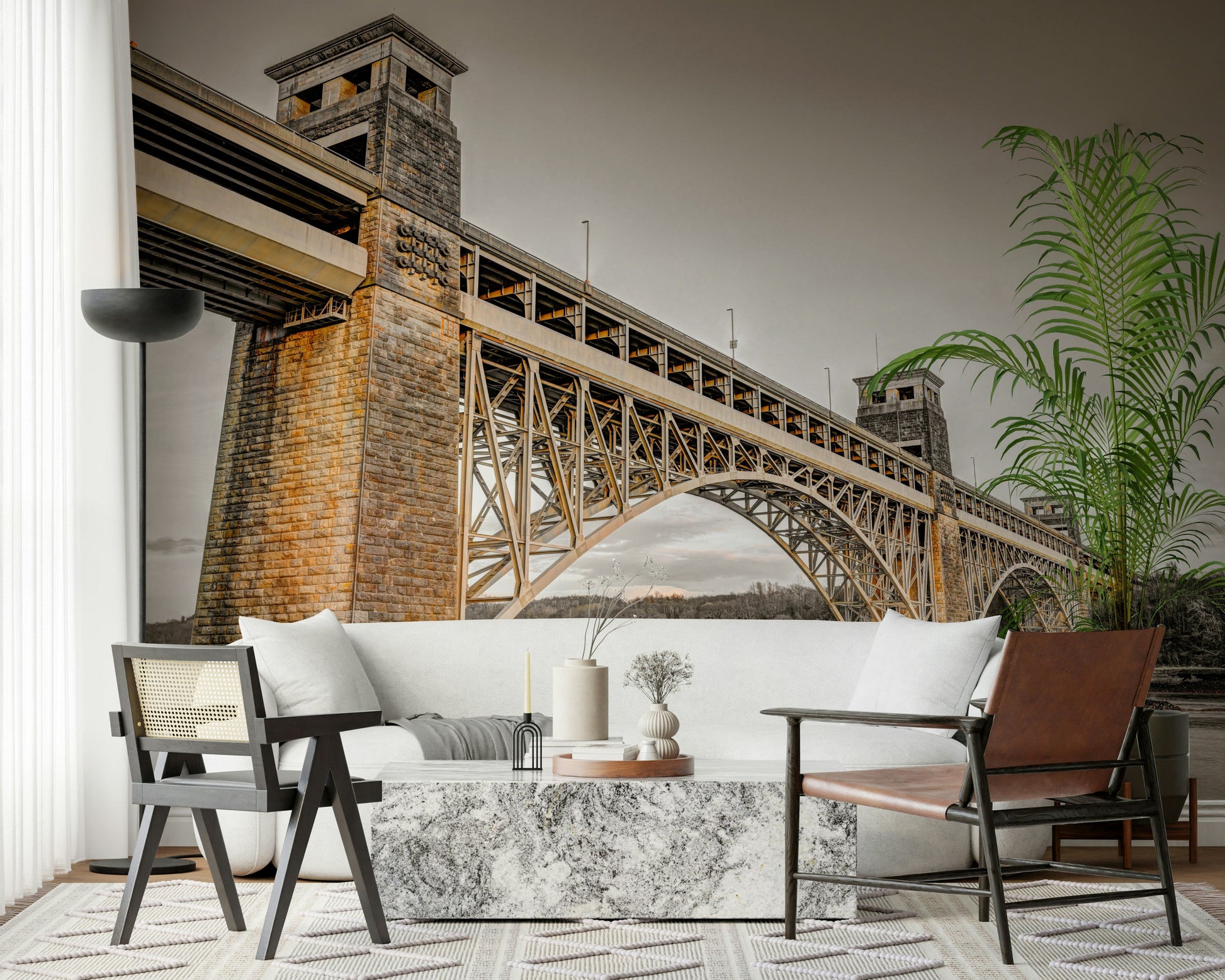 Architectural Britannia Bridge mural highlighting textured masonry pillars.