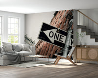 Wall mural depicting lively Brooklyn streets with classic city textures and signs.