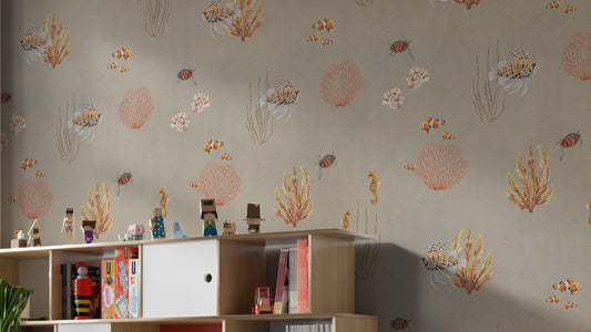 Brown Oceanic Wonders wallpaper with seahorses and coral above a wooden toy shelf in a kids room