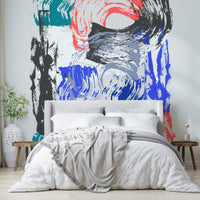 Dynamic brushstroke wall mural bringing energy and color indoors

