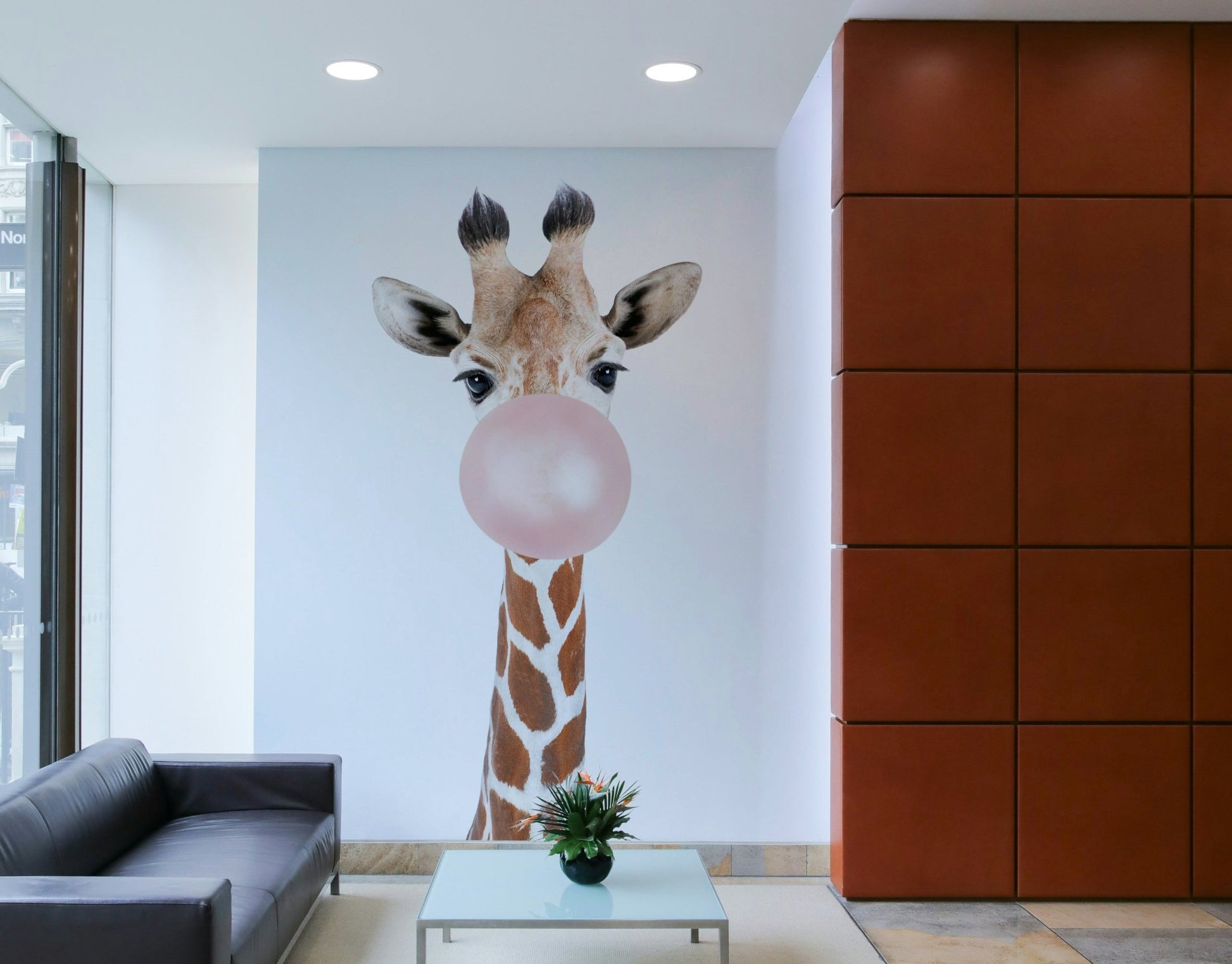 Cute giraffe with bubble gum in vibrant mural design for decor.

