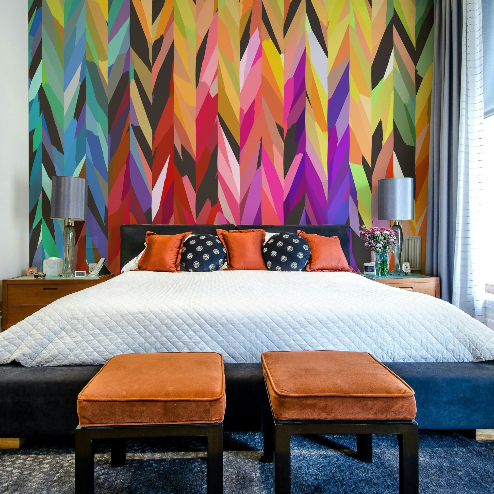 Rainbow-hued abstract art mural on feature wall

