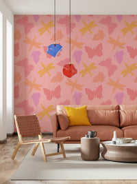 Soft pink wallpaper featuring playful butterflies and dragonflies in varied pastel colors.