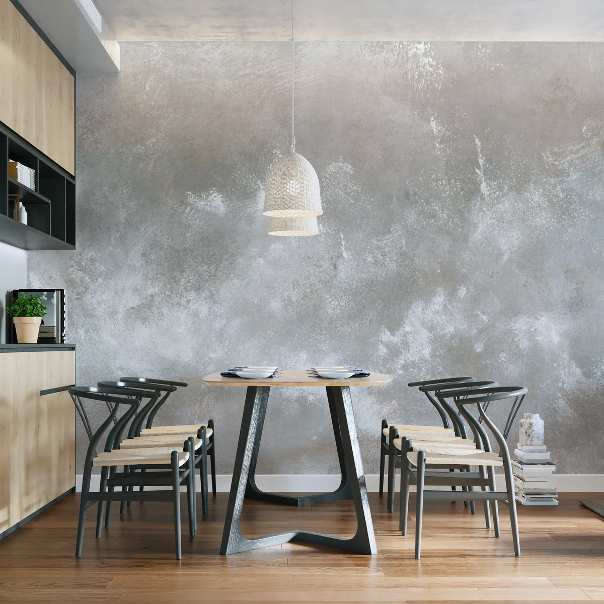 Baltic Sand Textured Abstract wallpaper mural in mottled grey plaster behind a round table and black wishbone chairs in a dining room