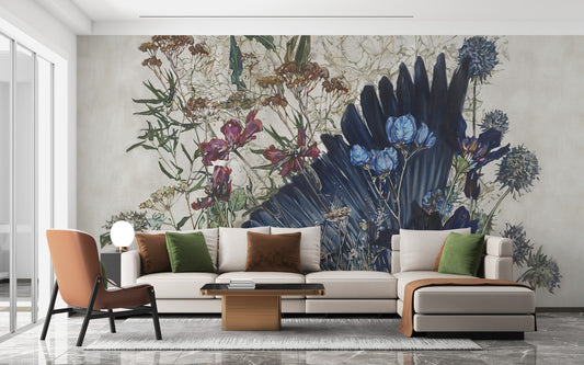 Dusk Till Dawn Floral wallpaper mural with navy palm fan and wildflowers behind a beige sectional and rust armchair