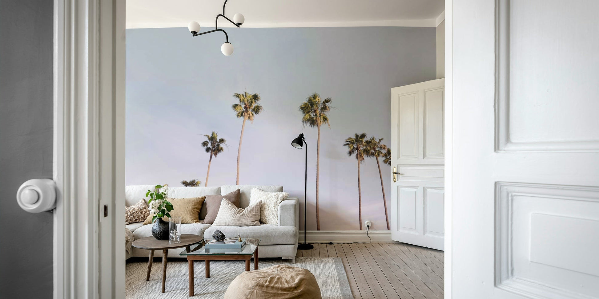 California Dreaming mural with a colorful sunset backdrop.

