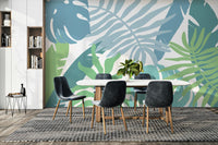 A graceful subtle leaf wall mural in cool, blue tones.

