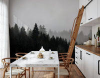 Atmospheric forest mural wallpaper, dusky trees cloaked in mist.