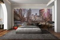 Bright sky with some clouds and a sun flare.

