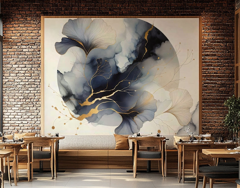 Chic Ginkgo Moon wallpaper mural with navy and gold ginkgo leaves framed on a brick wall above a cafe banquette