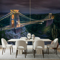 Dramatic illuminated stone towers on Clifton Suspension Bridge wallpaper.