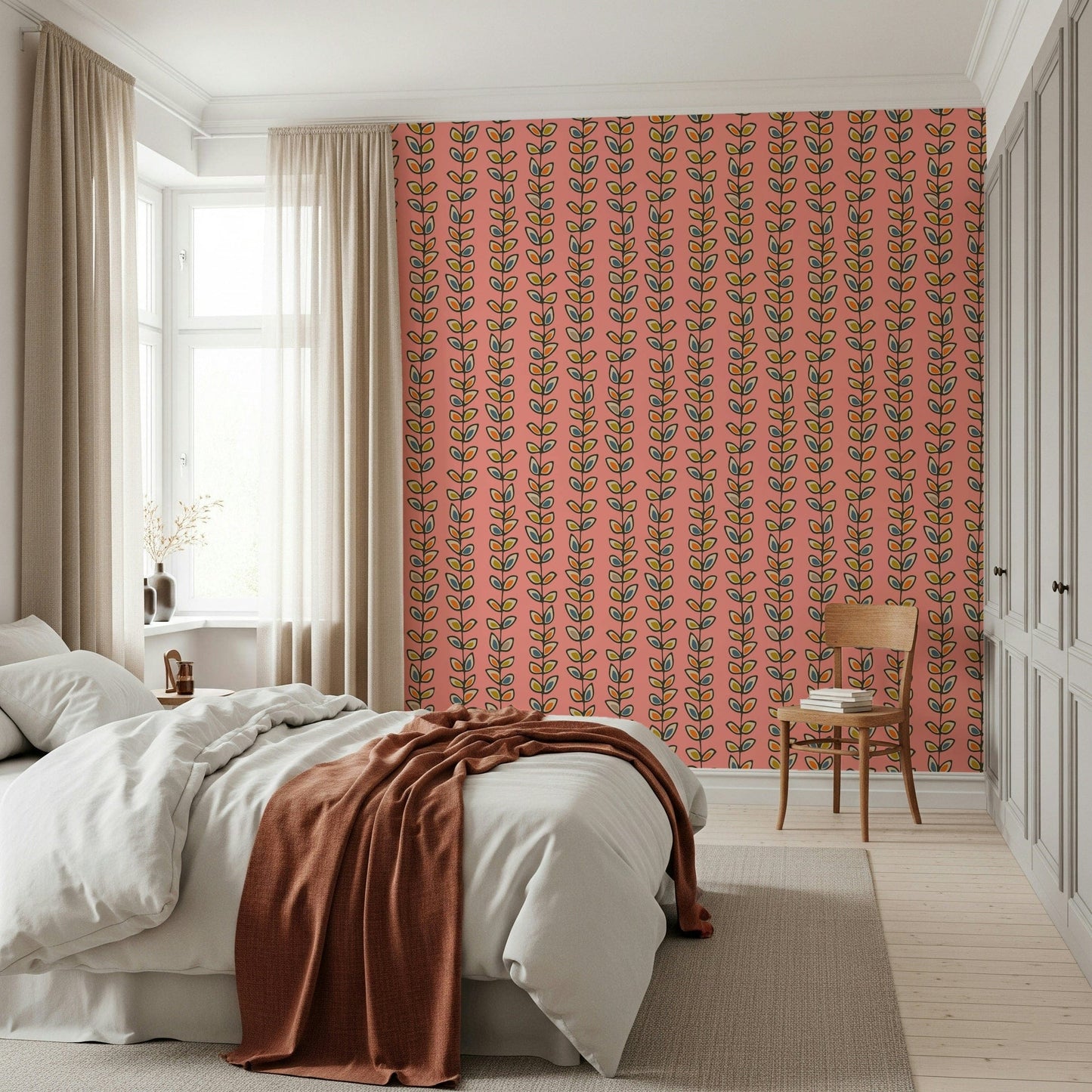 Pink retro wallpaper with delicate vine stripes holding small hand-drawn leaves in multiple colors.