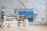 An artistic driftwood boat mural on minimalist wallpaper.

