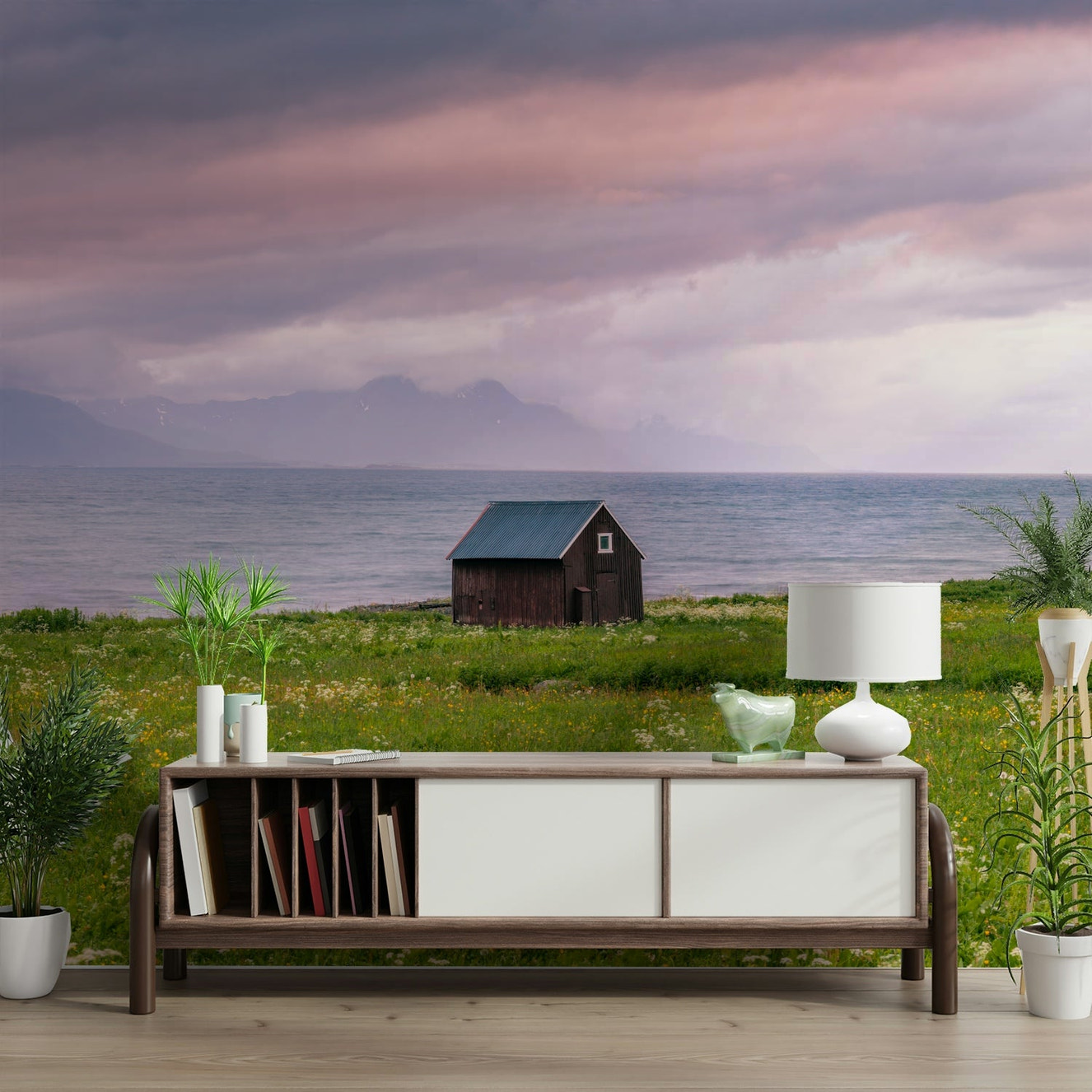 Lush green meadow meeting the tranquil sea under soft skies

