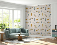 A beach-themed wallpaper with retro vans carrying surfboards in warm mustard and blue tones.