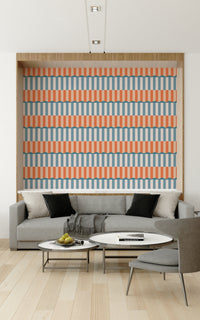 Fiery sunset sky blending into calm blue waves on a peaceful beach.