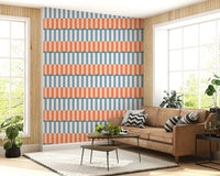 Gentle ocean waves glowing under a warm sunset sky with soft pastel clouds.