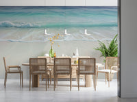 Entry space with coastal feature wall mural, bench and hooks, bright natural light