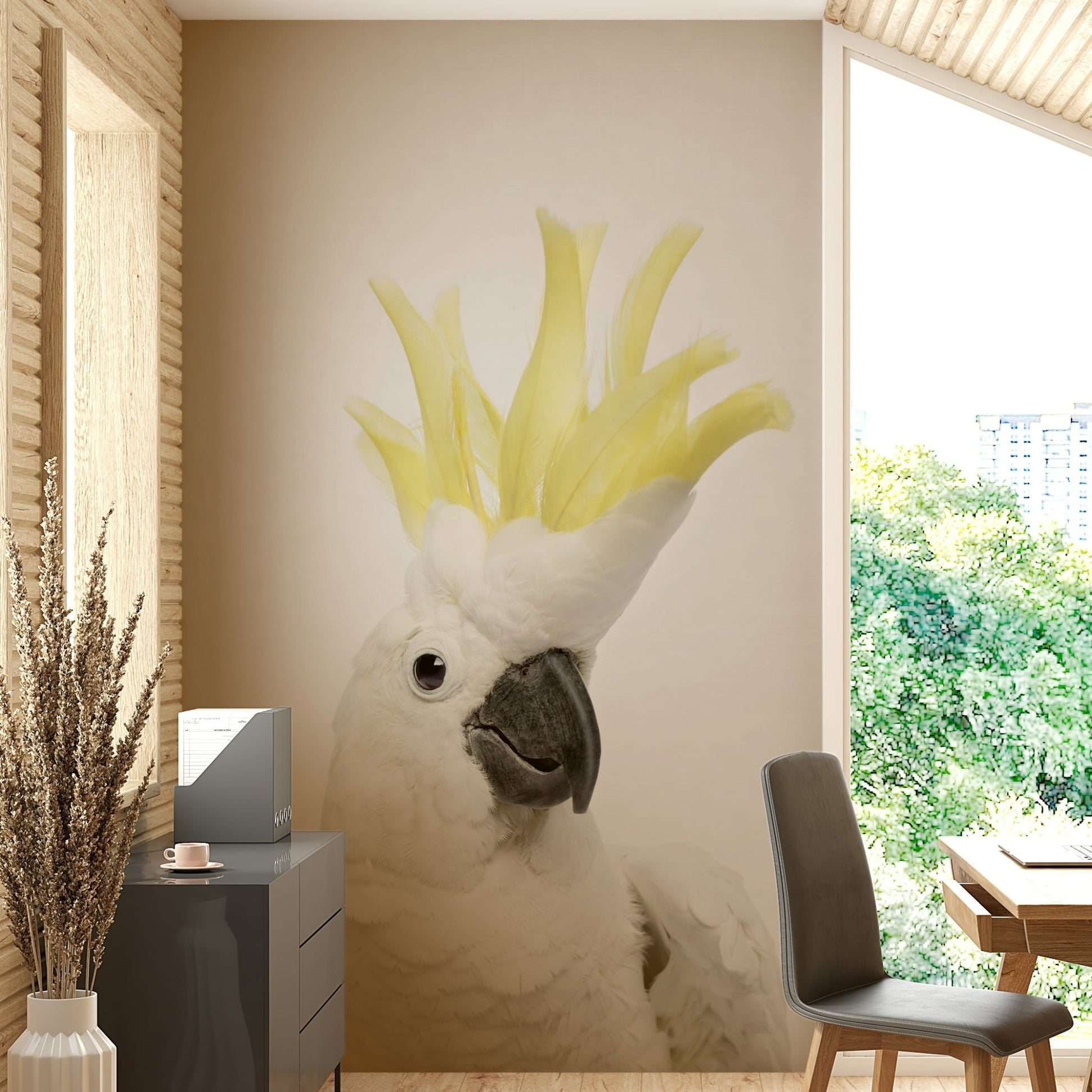 Bright white cockatoo perched among leaves

