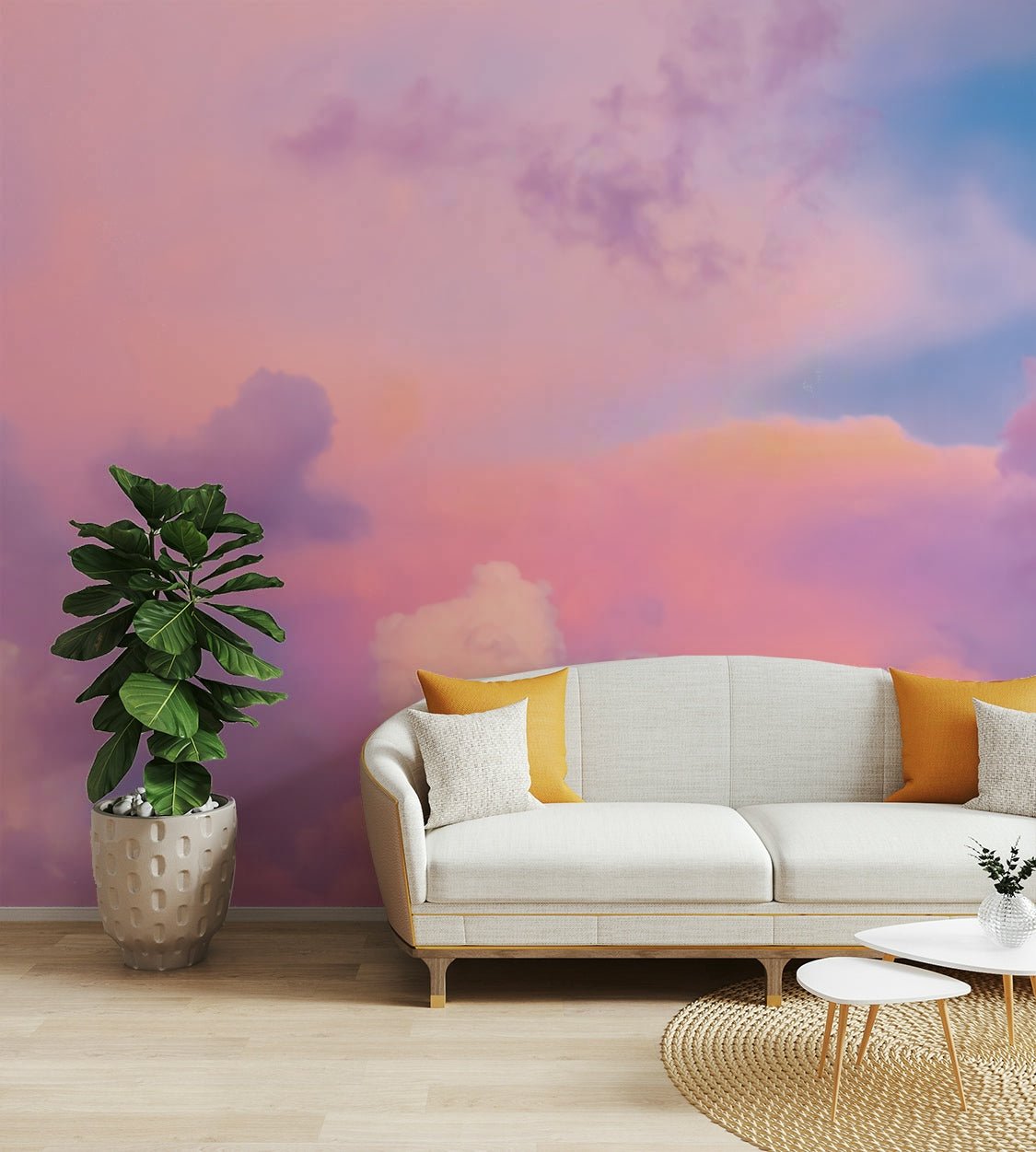 Colorful Clouds on Sunset Sky wallpaper mural in pink and purple behind a cream sofa with orange cushions in a living room