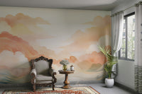 Large scale wall decor with coral and peach sky imagery for a home office.