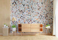 Refined Light Coral Terrazzo wallpaper subtle flecks creating a contemporary finish look.