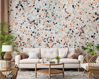 Appealing Light Coral Terrazzo mural texture close-up irregular shapes polished finish.