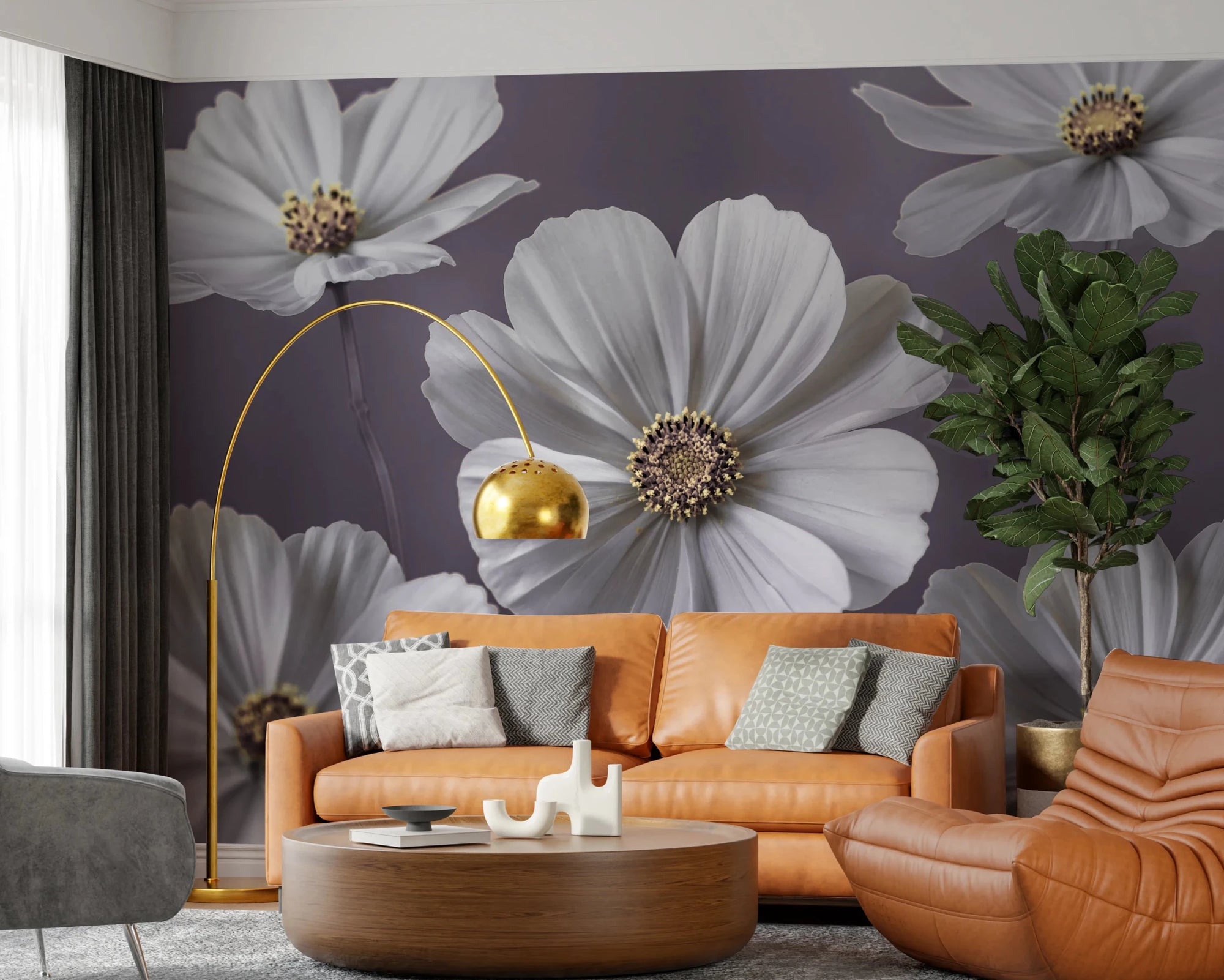 Cosmos Flowers wallpaper mural of white blooms on dusty purple behind a cognac leather sofa and gold arc lamp in a living room
