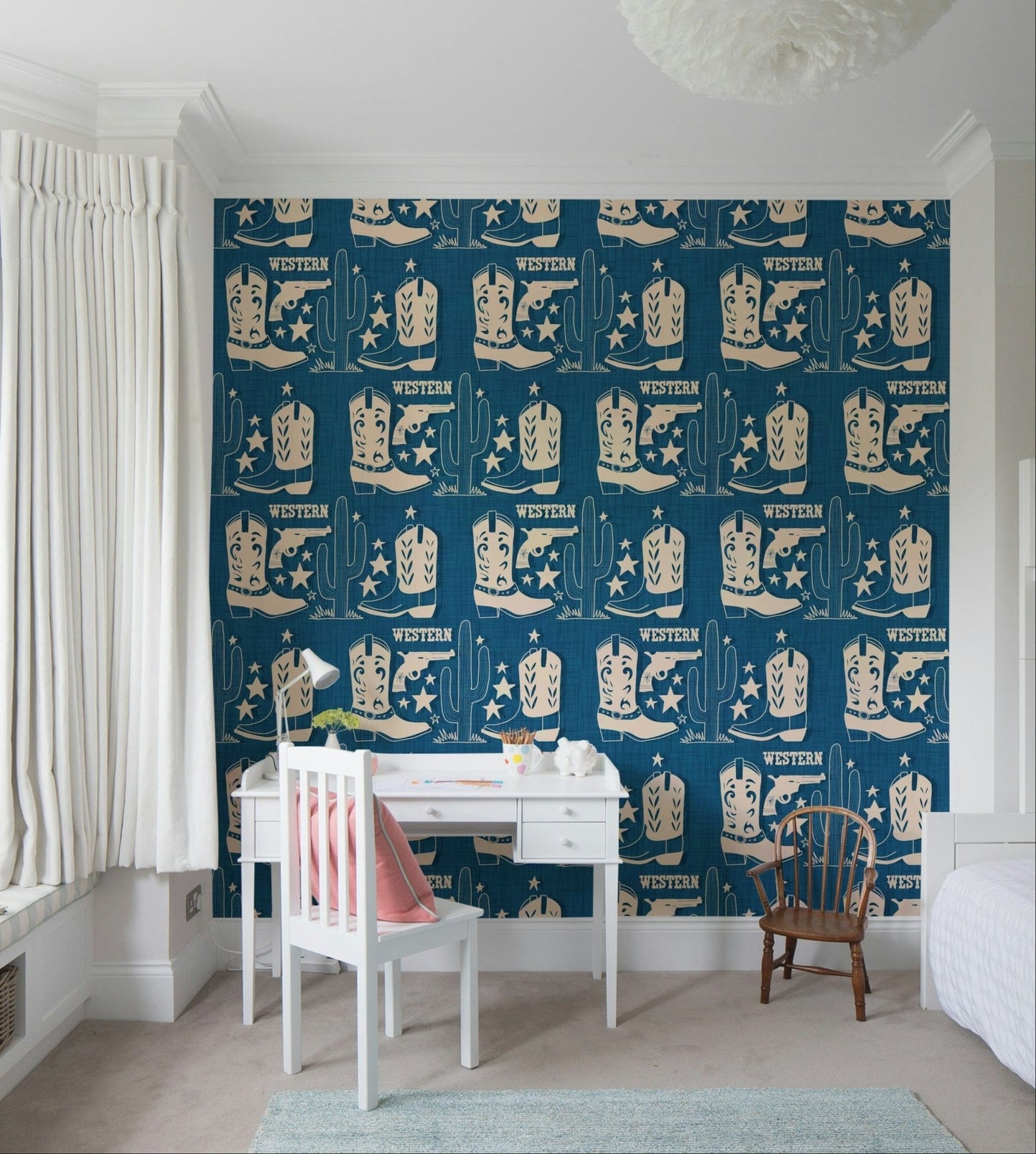 Rustic wallpaper mural featuring cowboy boots, pistols, and desert cacti in a repeating layout.