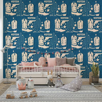 Cowboy Dreams wallpaper featuring Western boots, cacti, stars, and pistols in a rustic beige palette.