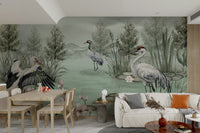 The scene also includes soft blossoms or water plants.

