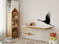 An artistic elegant crane mural on minimalist wallpaper.

