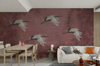 The composition features the birds against a light background.

