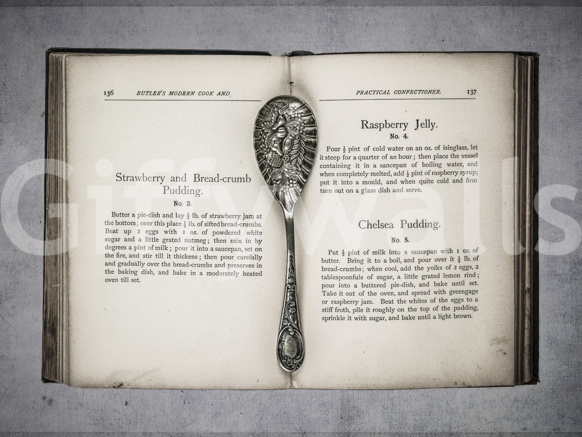 Culinary Antiques wall covering featuring worn book edges and silver details.