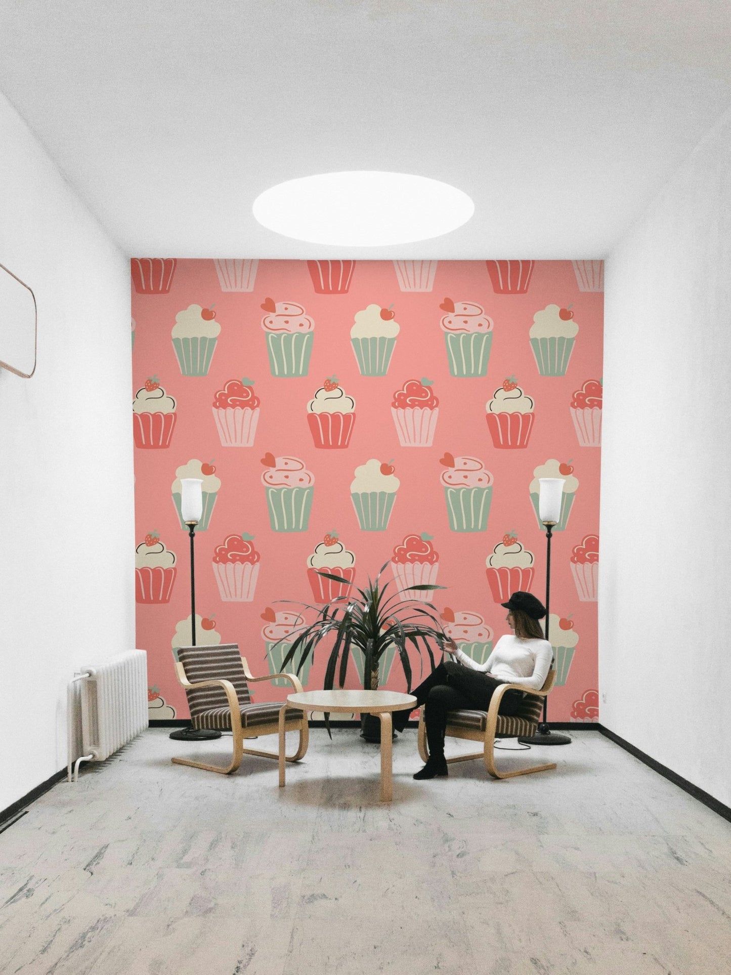 Whimsical wallpaper with cupcakes and playful pattern

