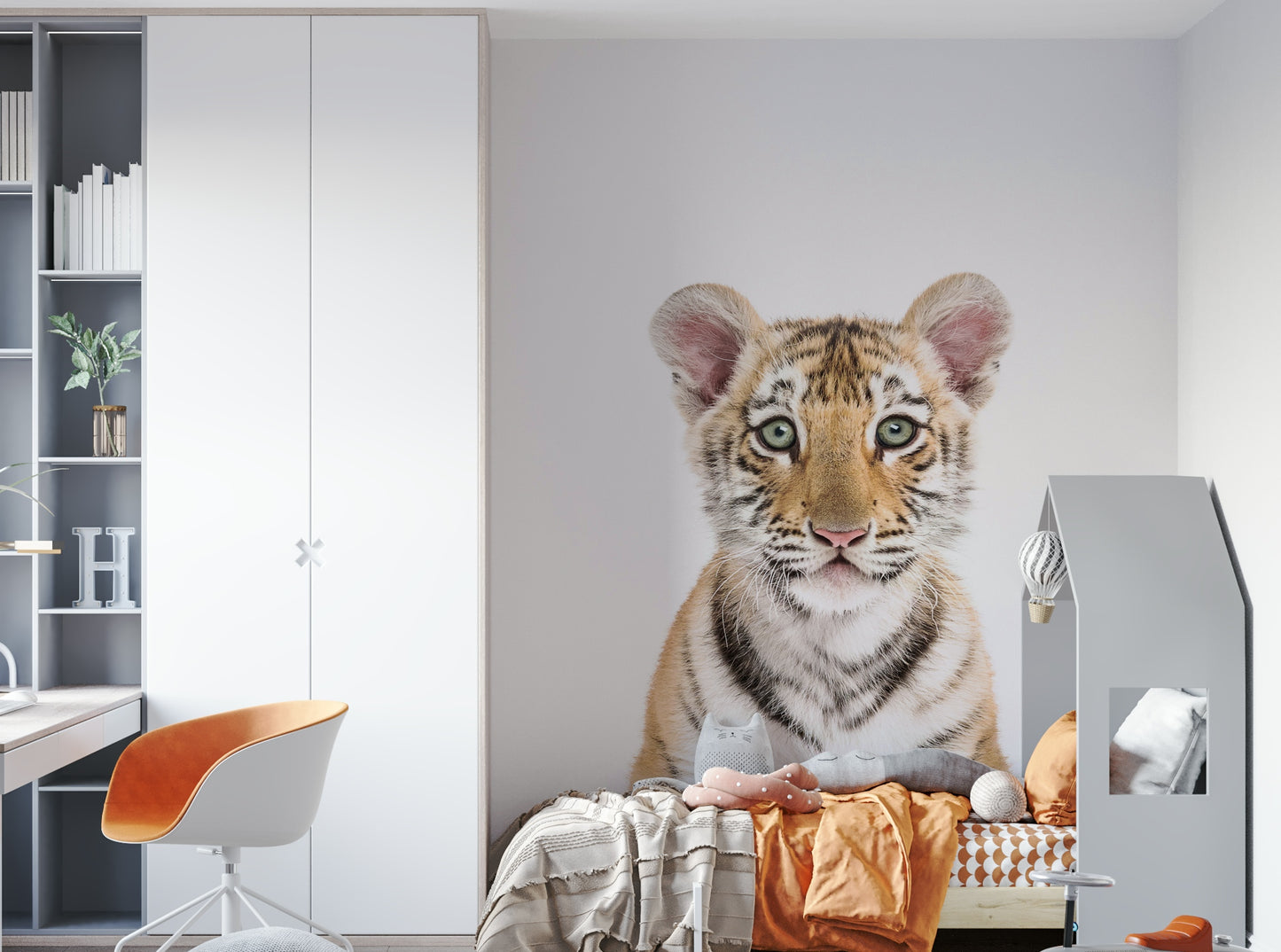 Cute tiger cub mural with soft forest background


