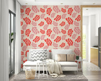 Nursery walls decorated with Cutout Leaves Wallpaper and soft neutral tones.