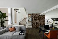 A wall mural of a dark and moody floral pattern.

