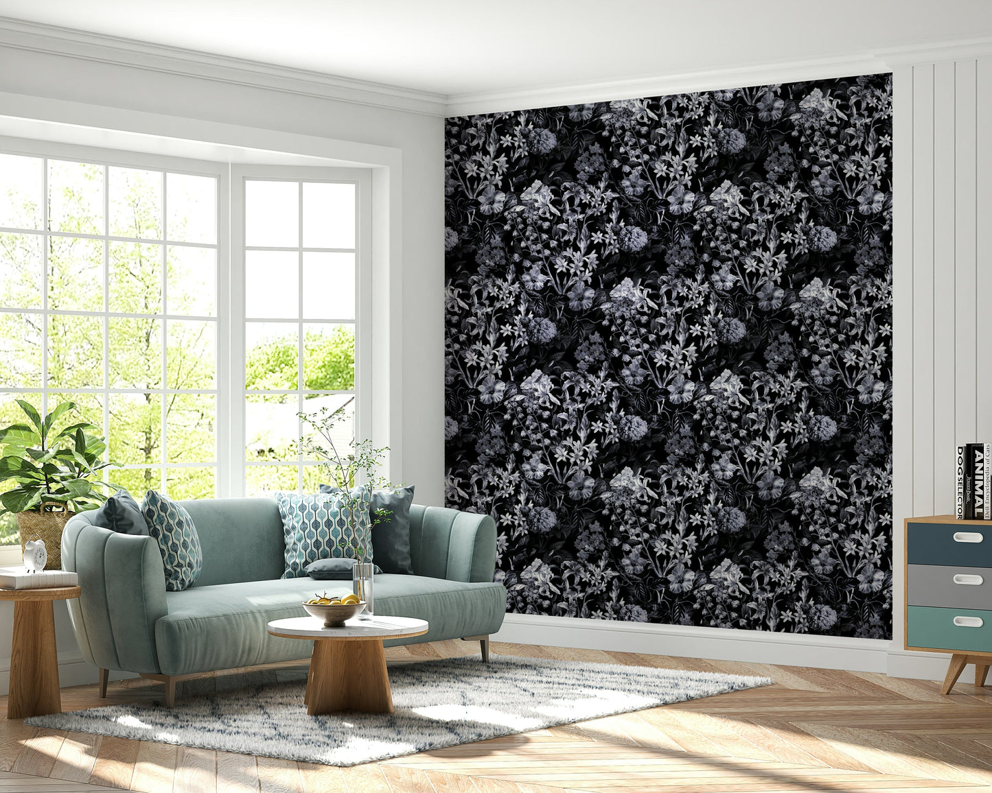 A dining room decorated with a dark floral mural

