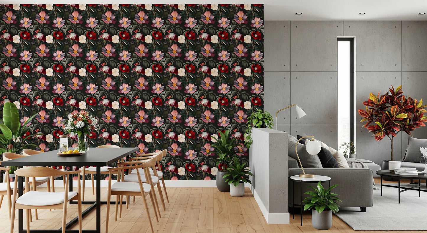 Dining and living area styled with moody floral wallpaper feels rich and softly dramatic