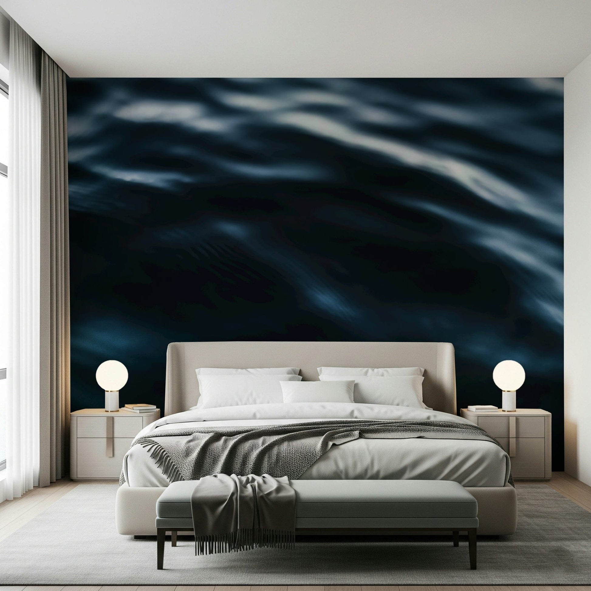 Wall mural depicting dynamic ocean waves in navy and teal for a coastal vibe.