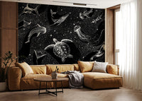 A peaceful open ocean mural on decorative wallpaper.